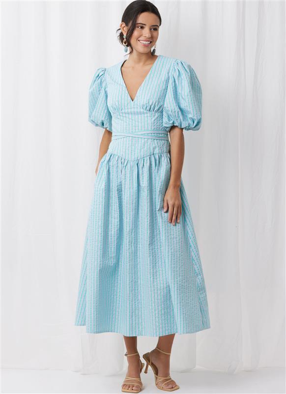Woman in blue dress with puffy sleeves